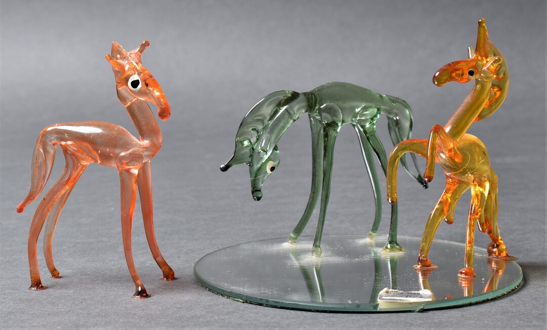 Three glass horse sculptures photographed by Sampson. Links to Product Photography page.